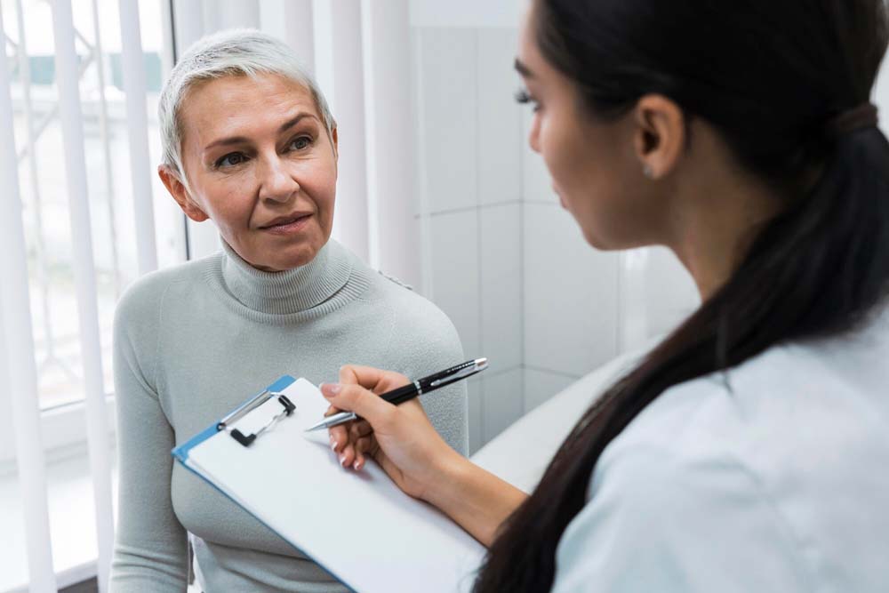 Doctor taking notes about patient