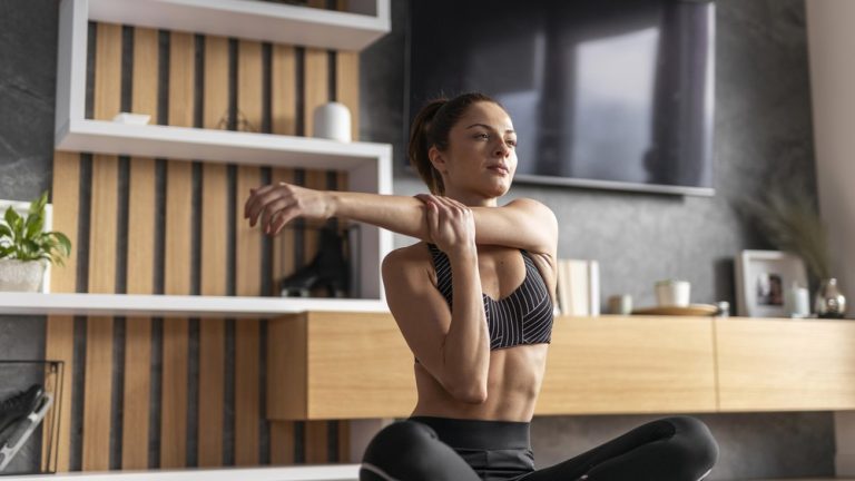 Woman stretching her arm