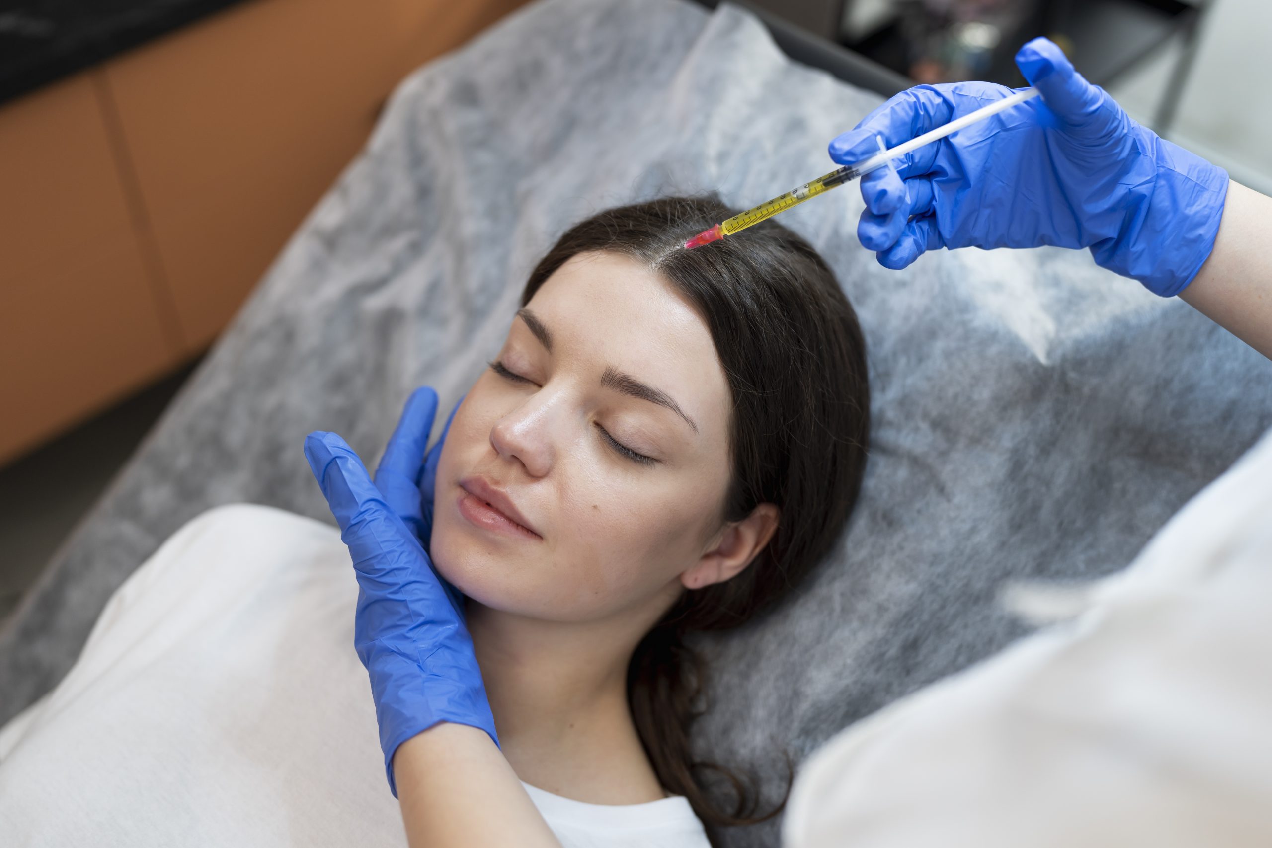 young-woman-getting-prp-injection-high-angle-scaled.jpg