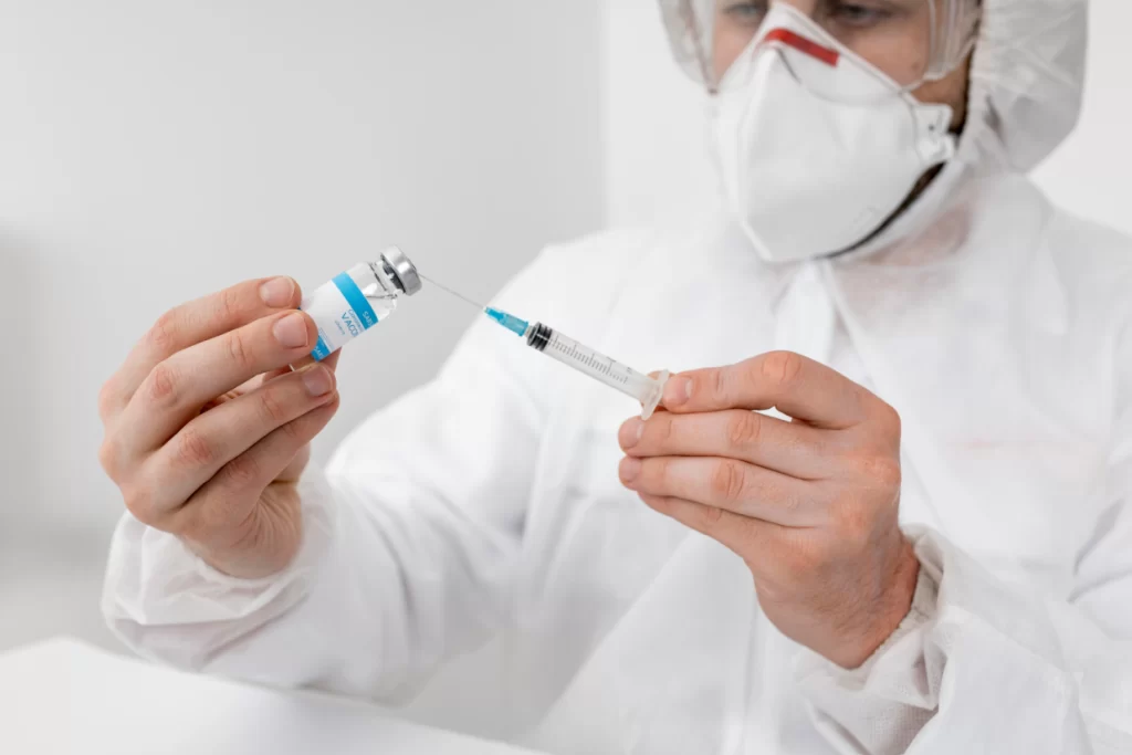 Close-up of a healthcare professional in full protective gear