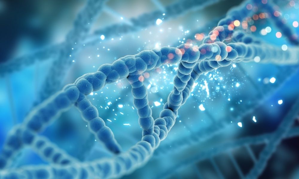 A stylized, three-dimensional illustration of a DNA double helix in a glowing blue hue.