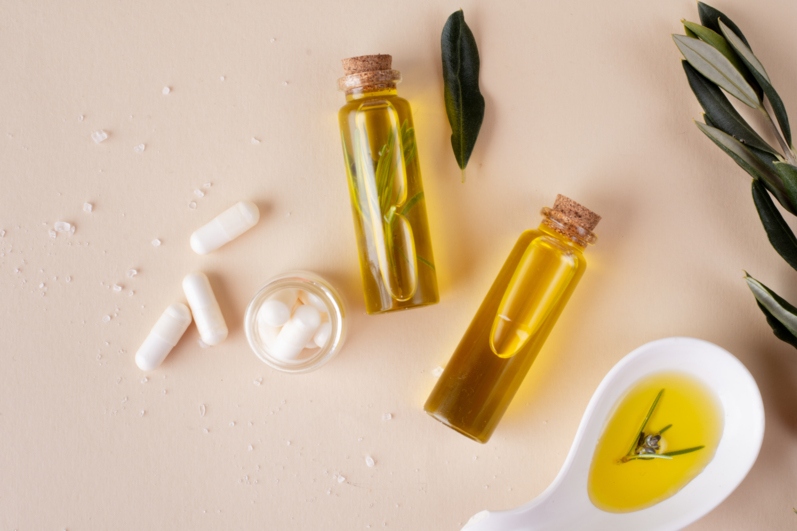 top-view-plastic-bottles-with-oil-pills-1_11zon.jpg
