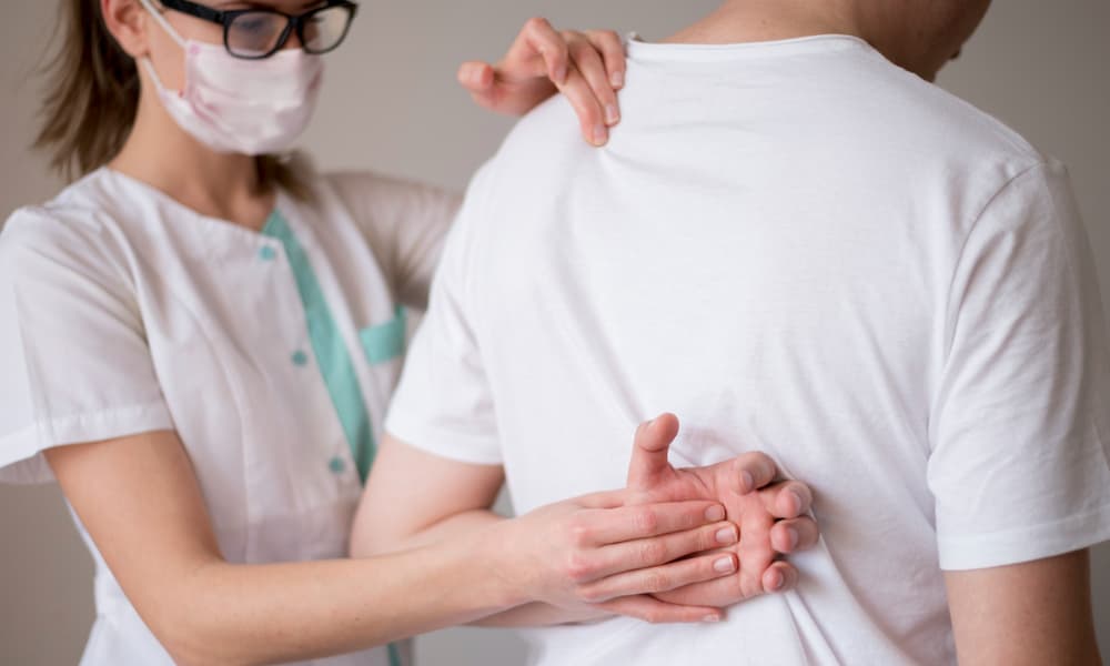 right arm behind the back stretch checkup by physician